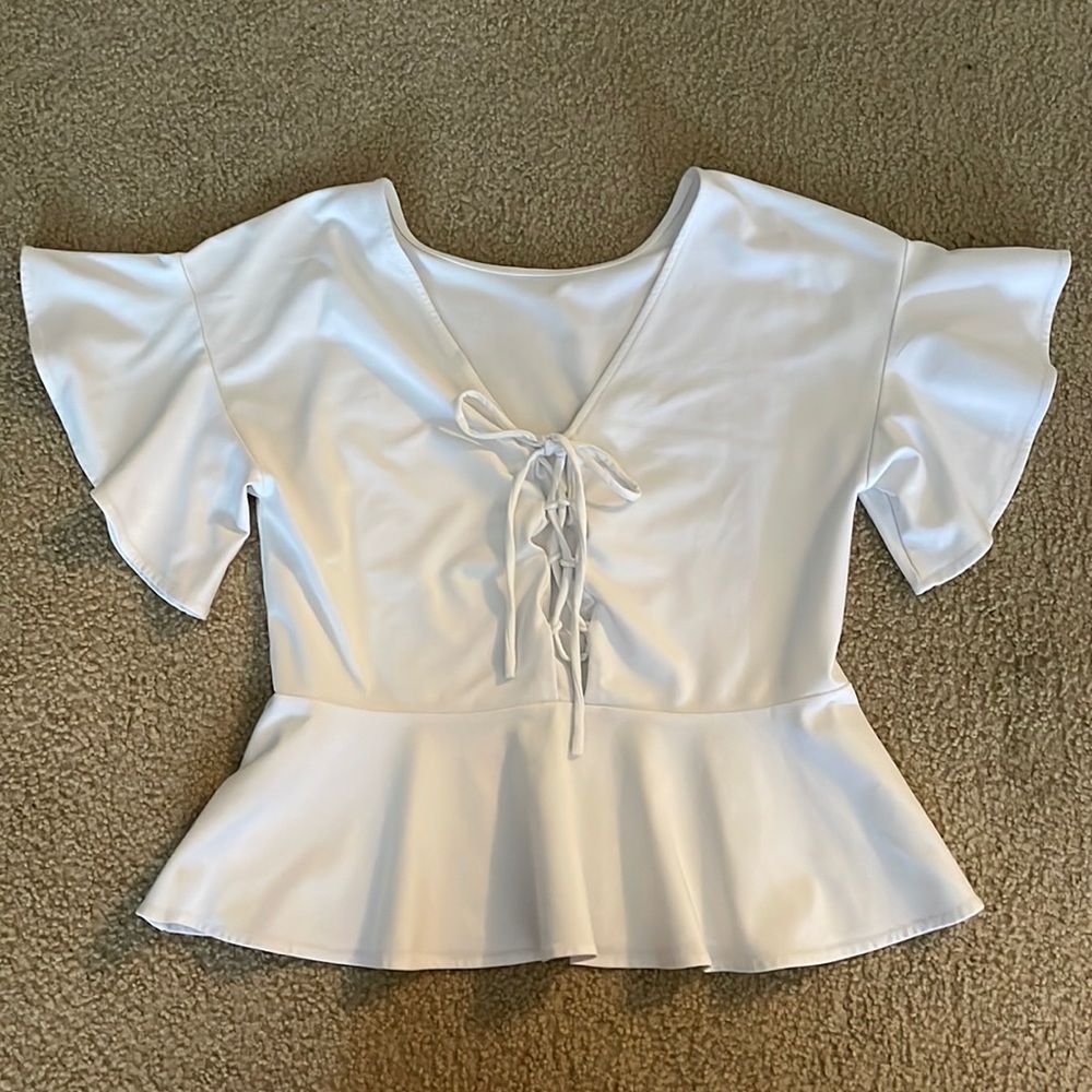 White peplum blouse with tie